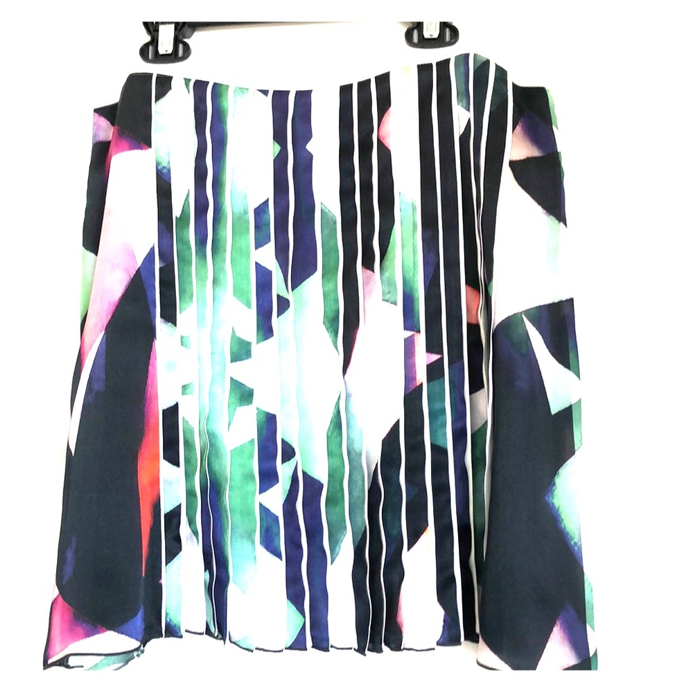 Emporio Armani mini, plated skirt. Made in Italy.